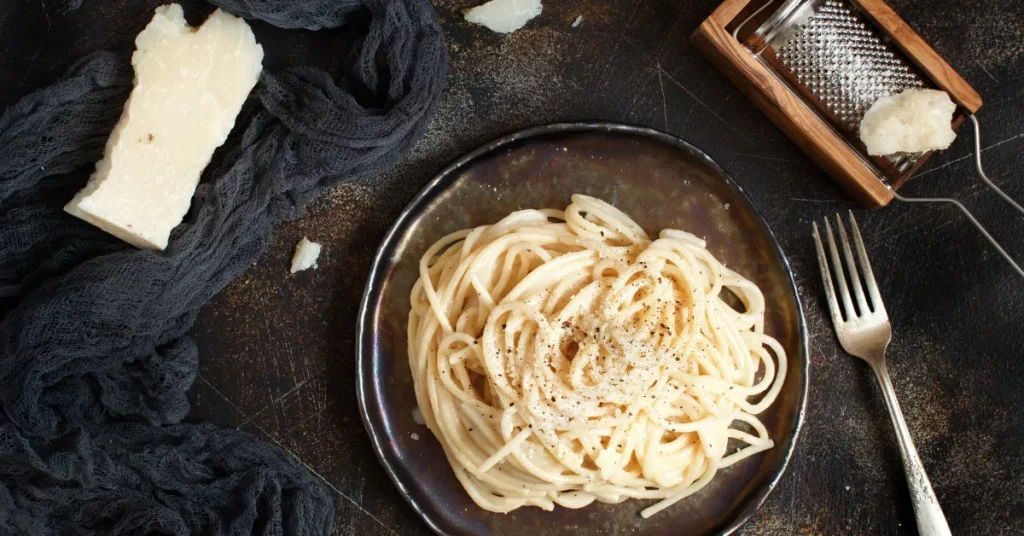 A visual guide displaying various cheese alternatives to Pecorino, such as Parmesan and Grana Padano, each paired with a plate of delicious Cacio e Pepe, showcasing their compatibility with the classic pasta dish.