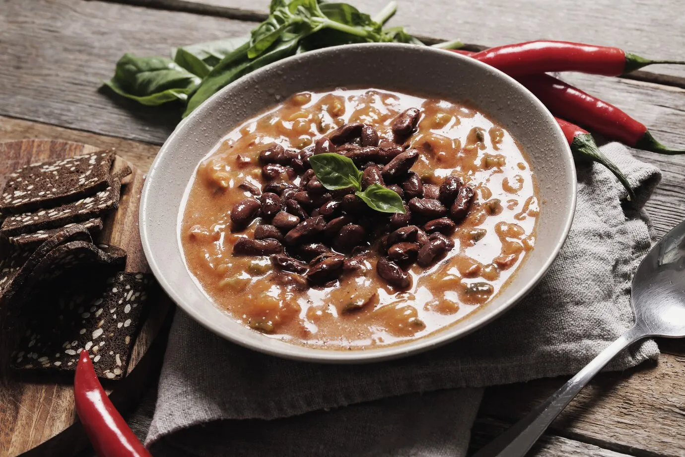 Enjoy the health benefits of eating a warm bowl of bean soup at night.