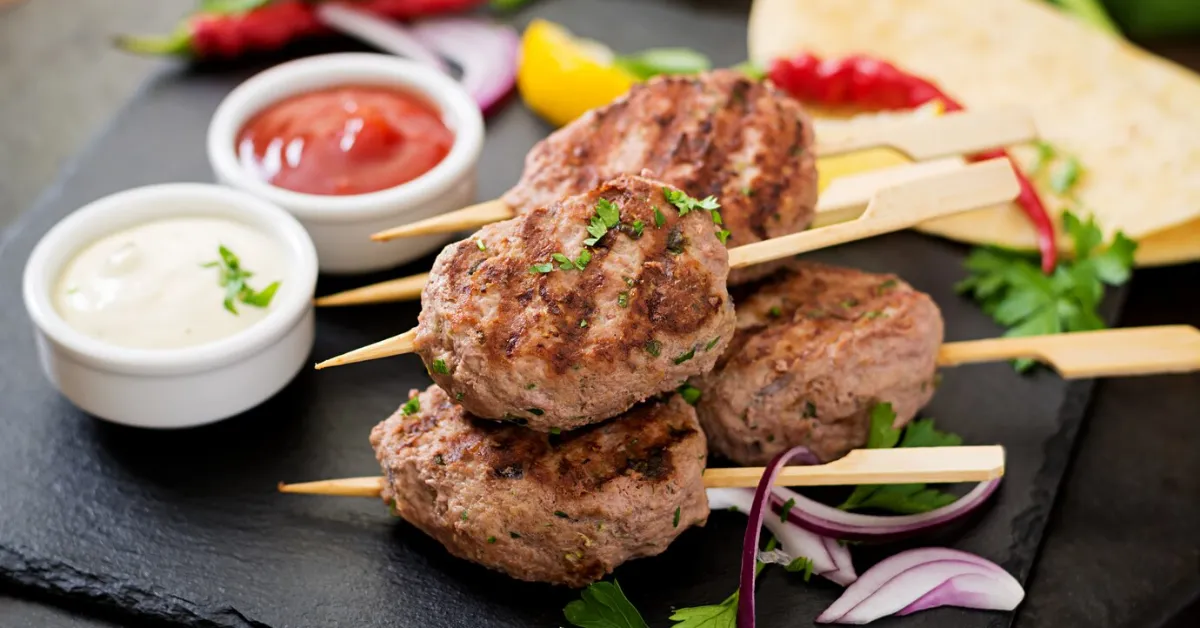 Mouthwatering meatballs on skewers, ready to be dipped in your favorite sauce.