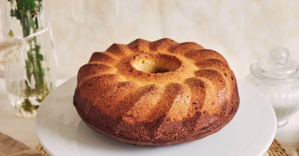 This photo of a bundt cake on a white plate is a delicious reminder of a centuries-old tradition.