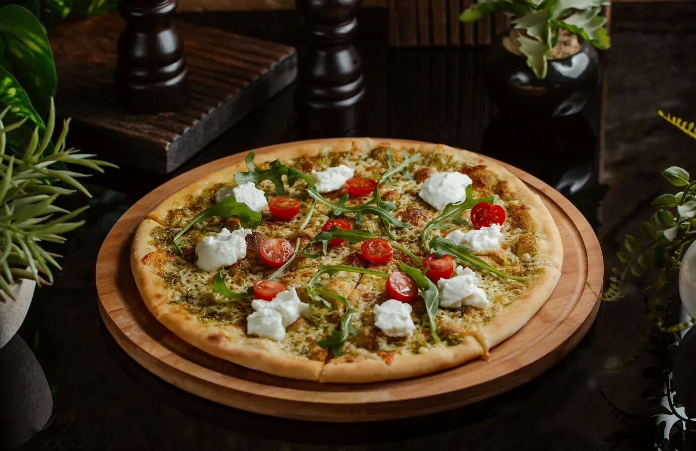 vegetable based pizza with white cheese and cherries