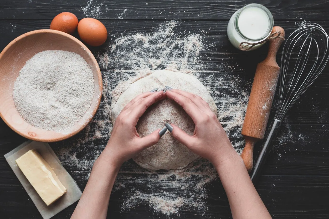 woman making delicious bread loaf using eggs and cake flour