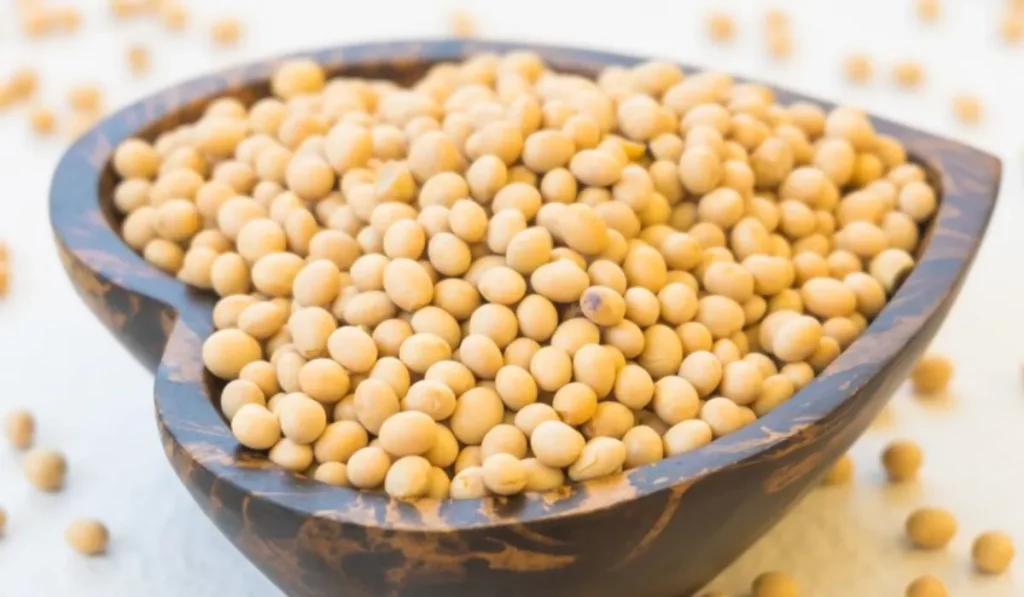 A healthy and nutritious snack of soybeans in a heart-shaped bowl.