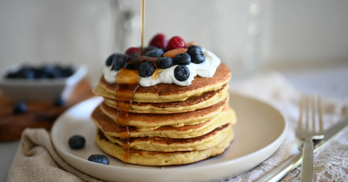 Pancakes with Fruits and Whipped Cream