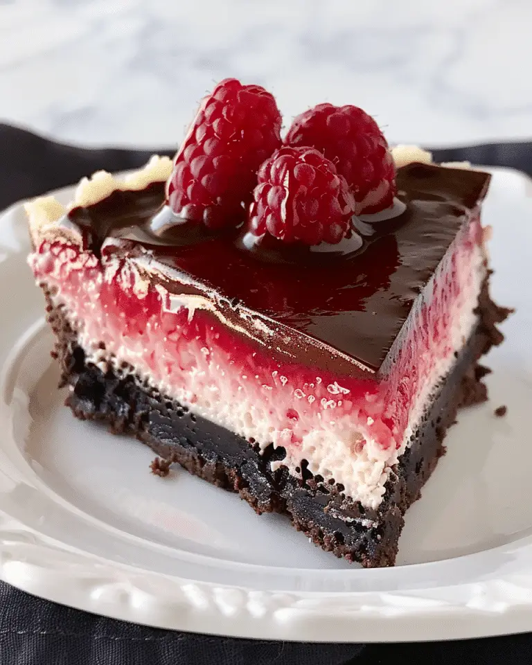 Chocolate Raspberry Cheesecake Delight - Recipes Smile