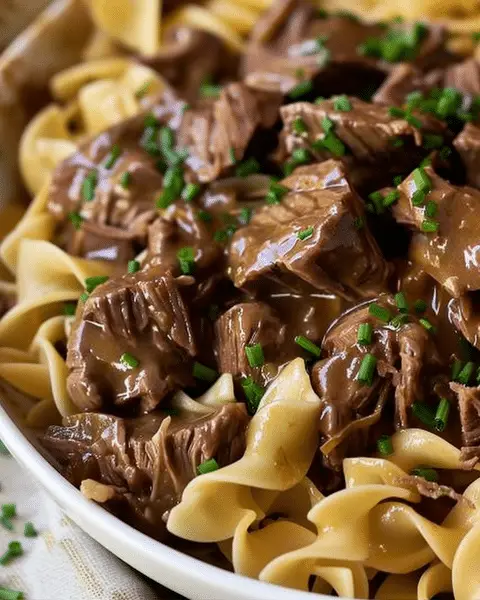 Crockpot Beef Tips & Noodles - Recipes Smile